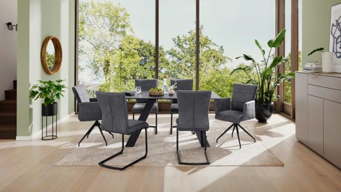 Tischgruppe Interliving aus Glas in Schwarz Interliving Esszimmer Serie 5122 – Essgruppen mit Schwingstühlen schwarzes Glas & Metall - ca. 160 x 90 cm