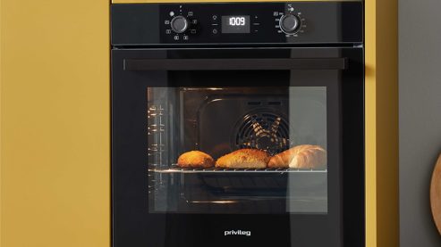 Einbauküche WERT KÜCHE® aus Holz in Holzfarben Dunkel WERT KÜCHE® Vanessa mit Einbaugeräten Eiche Siena & Olivegelb - Länge ca. 393 cm