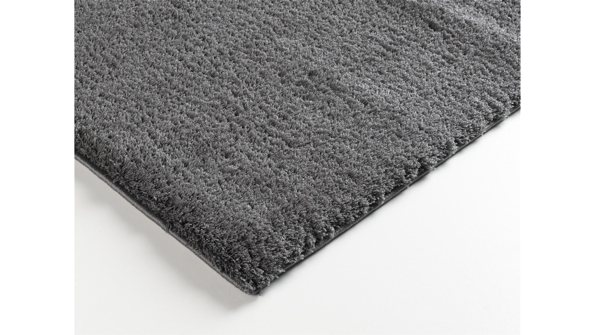 Hochflorteppich Oci aus Kunstfaser in Schwarz Hochflorteppich Soft Dream für Ihre Wohnaccessoires dunkelgraue Kunstfaser – ca. 65 x 130 cm