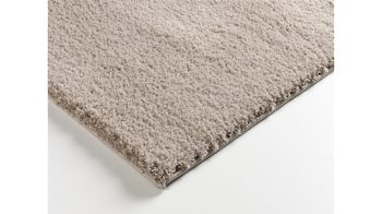 Hochflorteppich Oci aus Kunstfaser in Beige Hochflorteppich Soft Dream für Ihre Wohnaccessoires beige Kunstfaser – ca. 65 x 130 cm