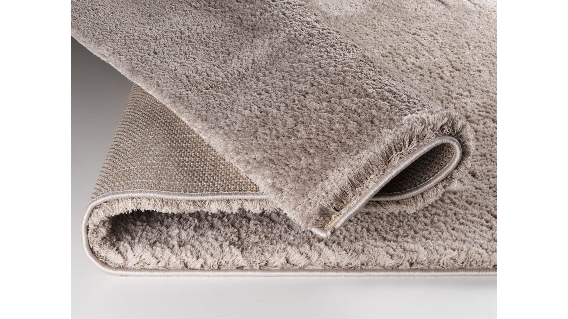 Hochflorteppich Oci aus Kunstfaser in Beige Hochflorteppich Soft Dream für Ihre Wohnaccessoires beige Kunstfaser – ca. 65 x 130 cm