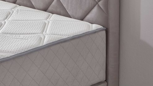 Boxspringbett KAWOO aus Stoff in Hellgrau KAWOO Boxspringbett Eberndorf silberfarbener Bezug 50562-720 – Liegefläche ca. 180 x 200 cm