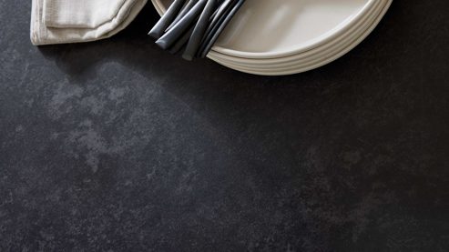 Auszugtisch Interliving aus Keramik in Schwarz Interliving Esszimmer Serie 5123 – Kulissentisch Glas-Keramik Oxid & schwarzes Metall - ca. 220 - 340 x 100 cm