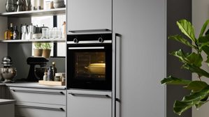 Einbauküche culineo® aus Holz in Dunkelgrau Culineo® Einbauküche C357 mit SIEMENS Einbaugeräten Schiefergrau - Stellfläche ca. 250 x 275 cm