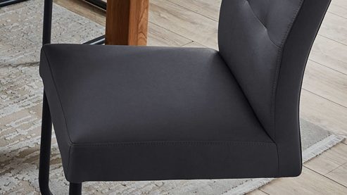 Schwingstuhl PARTNERRING COLLECTION aus Stoff in Dunkelgrau PARTNERRING COLLECTION Schwingstuhl Hilo dunkelgraue Lederoptik Vega 95 & schwarzes Rundrohr