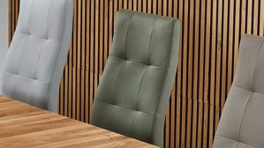 Schwingstuhl PARTNERRING COLLECTION aus Stoff in Grün PARTNERRING COLLECTION Schwingstuhl Hilo olivgrüne Lederoptik Vega 37 & schwarzes Rundrohr