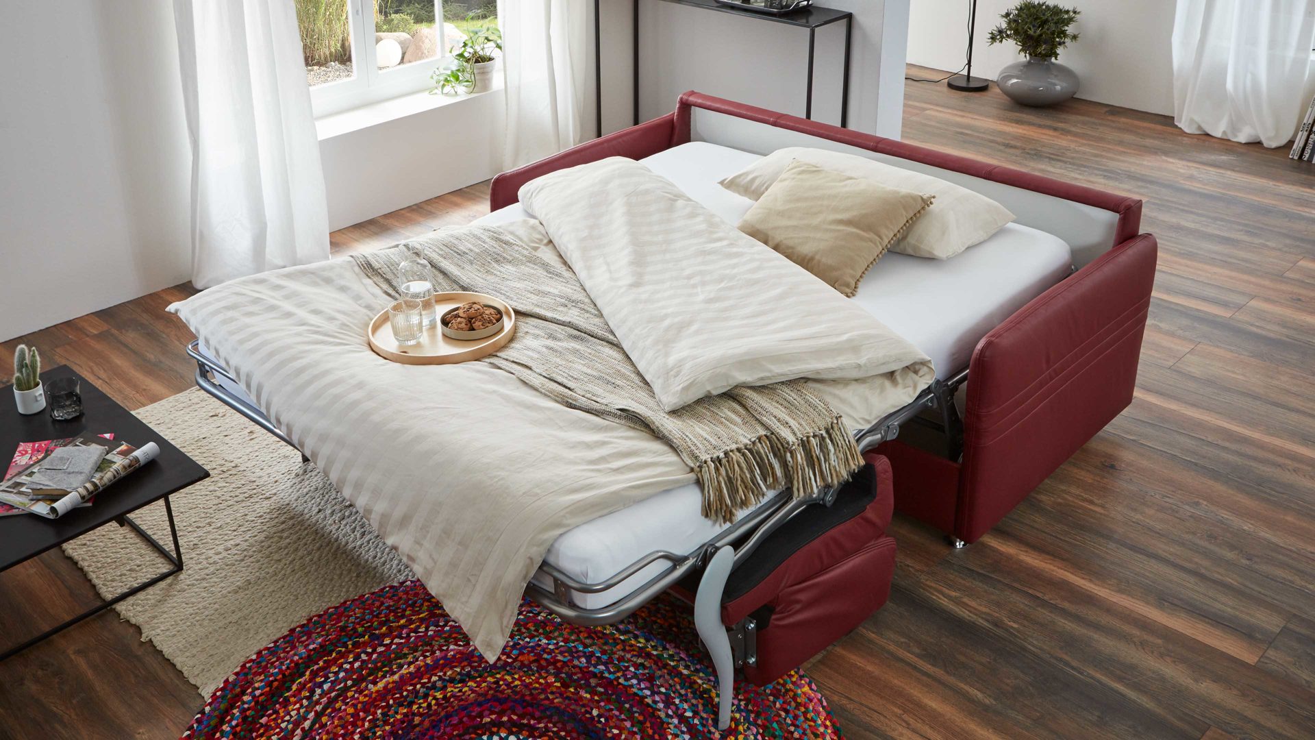 Schlafsofa comfortmaster besser sitzen, liegen, leben aus Leder in Rot Comfortmaster Messina Funktionssofa - Schlafcouch dunkelrotes Leder 20-1030 & Chromfüße 84 - Breite ca. 157 cm