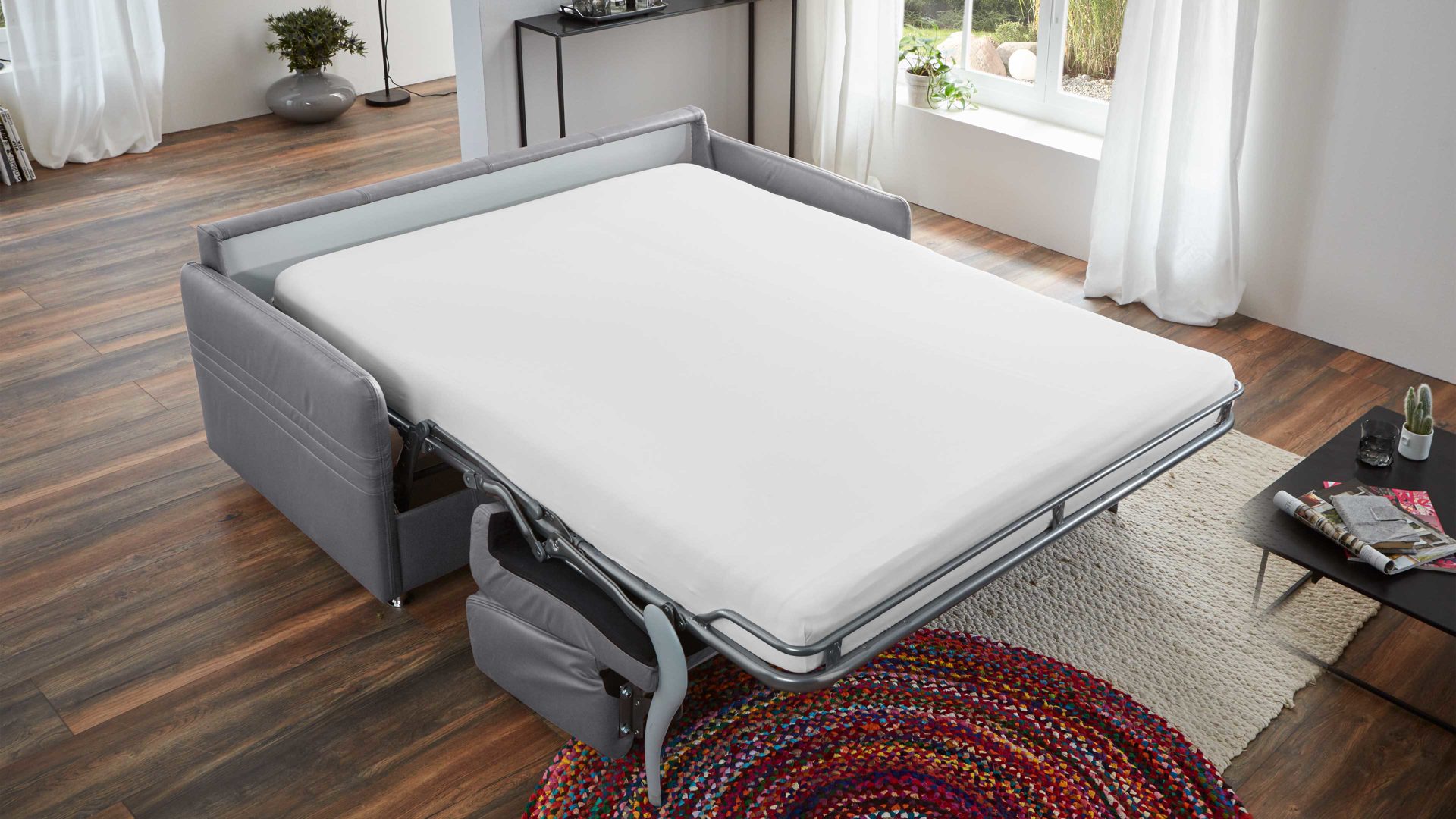 Schlafsofa comfortmaster besser sitzen, liegen, leben aus Leder in Hellgrau Comfortmaster Messina Funktionssofa - Schlafcouch hellgraues Leder 20-1080 & Chromfüße 84 - Breite ca. 157 cm