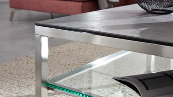 Couchtisch Interliving aus Keramik in Grau Interliving Couchtisch Serie 6210 - Couchtisch zementgraue Keramik & Edelstahl - ca. 85 x 85 cm