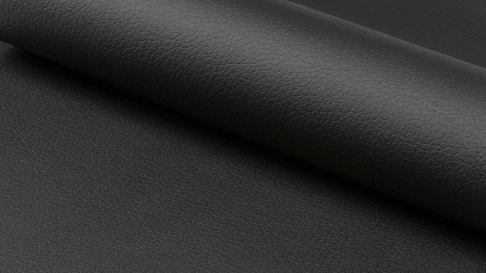 Vierfußstuhl Actona group aus Stoff in Schwarz Polsterstuhl Eris schwarzes Kunstleder D158 & Chromfüße