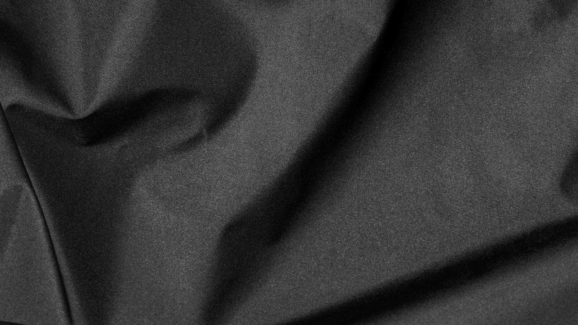 Sitzsack-Hocker Magma sitting point aus Kunstfaser in Schwarz SITTING POINT Sitzsack-Hocker dotcom scuba® als Kleinmöbel schwarze Kunstfaser – Durchmesser ca. 50 cm