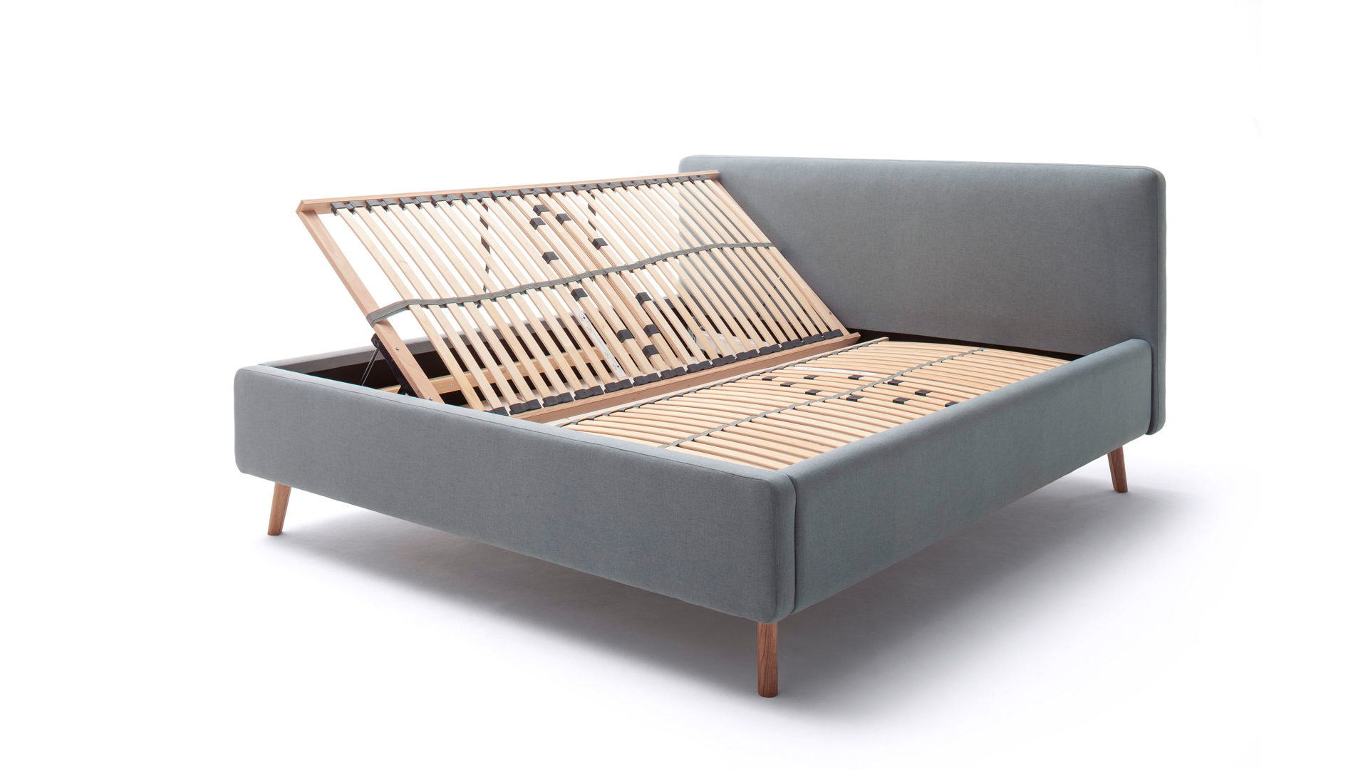Bettgestell Meise.möbel aus Stoff in Blau Polsterbettgestell Mattis mit Bettkasten eisblaues Flachgewebe Aspen 84 & Holzfüße - Liegefläche ca. 180 x 200 cm