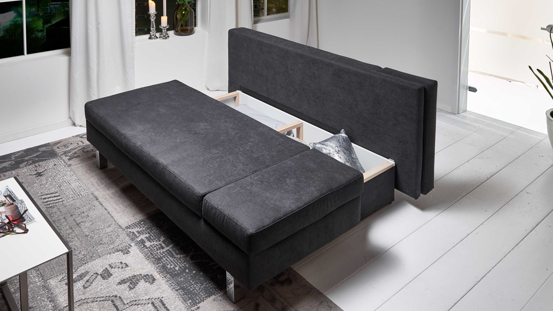 Schlafsofa Restyl aus Stoff in Schwarz Schlafsofa Tino schwarzer Bezug 55-6323 & chromfarbene Metallüße