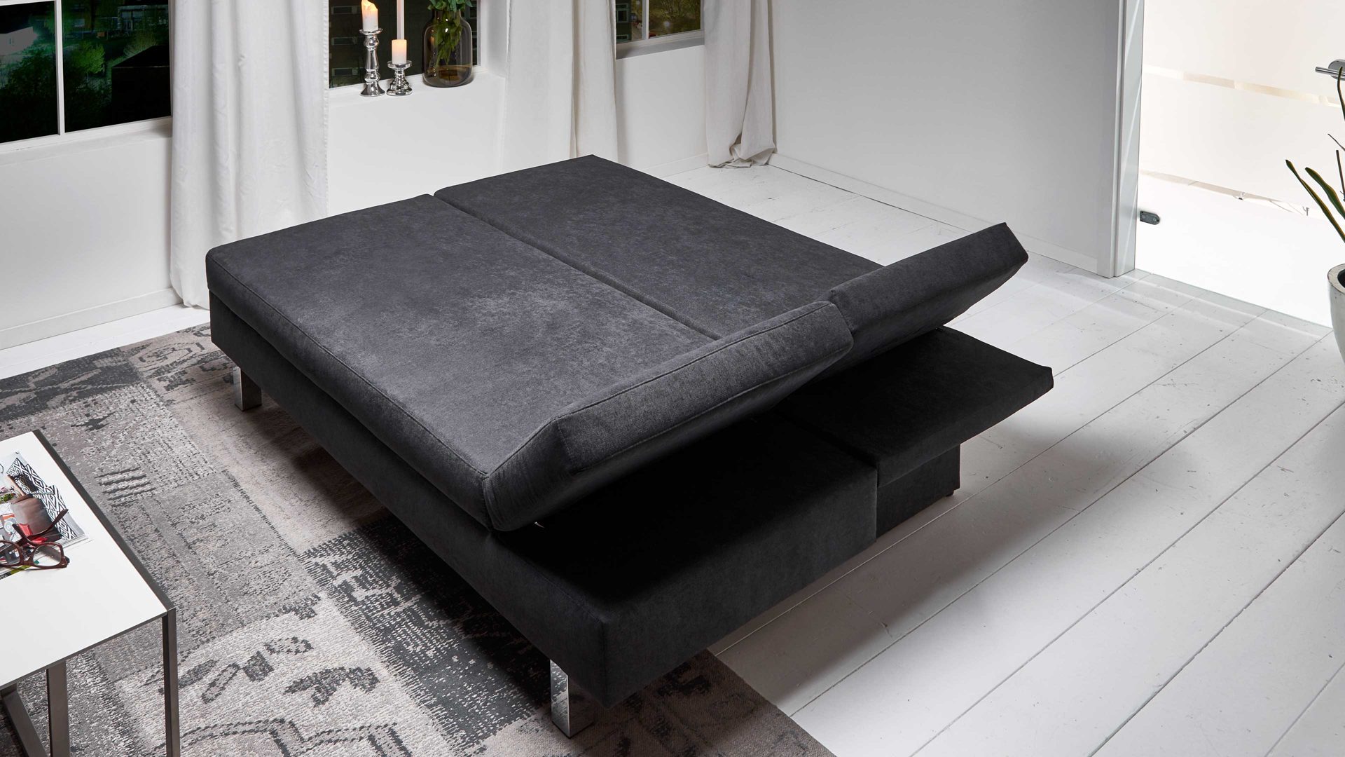 Schlafsofa Restyl aus Stoff in Schwarz Schlafsofa Tino schwarzer Bezug 55-6323 & chromfarbene Metallüße