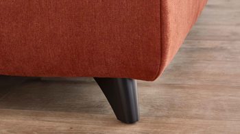 Polsterhocker KAWOO aus Stoff in Orange KAWOO Polstermöbel Santa Rosa - XXL-Polsterhocker kupferfarbene Bezüge Lincoln & Miranda, schwarze Metallfüße - ca. 128 x 68 cm