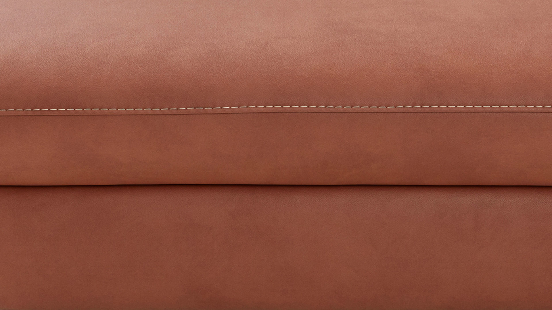 Polsterhocker Steinpol polsteria aus Stoff in Orange Polsterprogramm Relaxa Trend 2.0 - Hocker cognacfarbener Bezug Kevin & Schwarz - ca. 120 x 65 cm