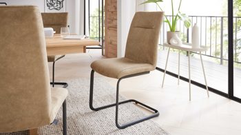 Schwingstuhl Interliving aus Stoff in Beige Interliving Esszimmer Serie 5604 - Schwingstuhl papyrusfarbener Bezug Hanoy & anthrazitfarbenes Metall