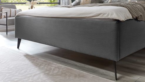 Bettgestell comfortmaster besser sitzen, liegen, leben aus Stoff in Grau Comfortmaster Polsterbettgestell grauer Breitcord Poso 60 & schwarze Metallfüße - Liegefläche ca. 180 x 200 cm