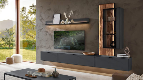 Wohnwand Wöstmann markenmöbel aus Holz in Dunkelgrau WÖSTMANN Wohnprogramm WM 2470 - Wohnwand graphitgrauer Lack & Spaltholz - vierteilig, Breite ca. 304 cm