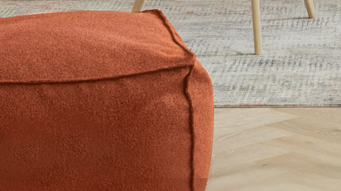 Polsterhocker Roomio® aus Stoff in Orange Roomio® No. 4121 - Hocker rostfarbener Stoffbezug Loop - ca. 86 x 86 cm