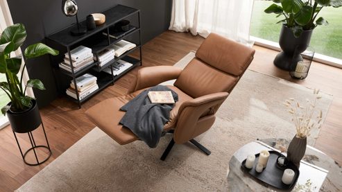 Relaxsessel Interliving aus Leder in Braun Interliving Sessel Serie 4566 haselnussfarbenes Leder Punch & schwarzer Sternfuß